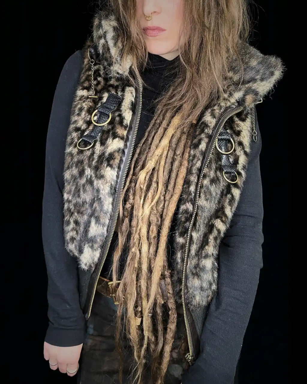 Leo fur vest with stand-up collar, metal appliqués and CAT backpatch