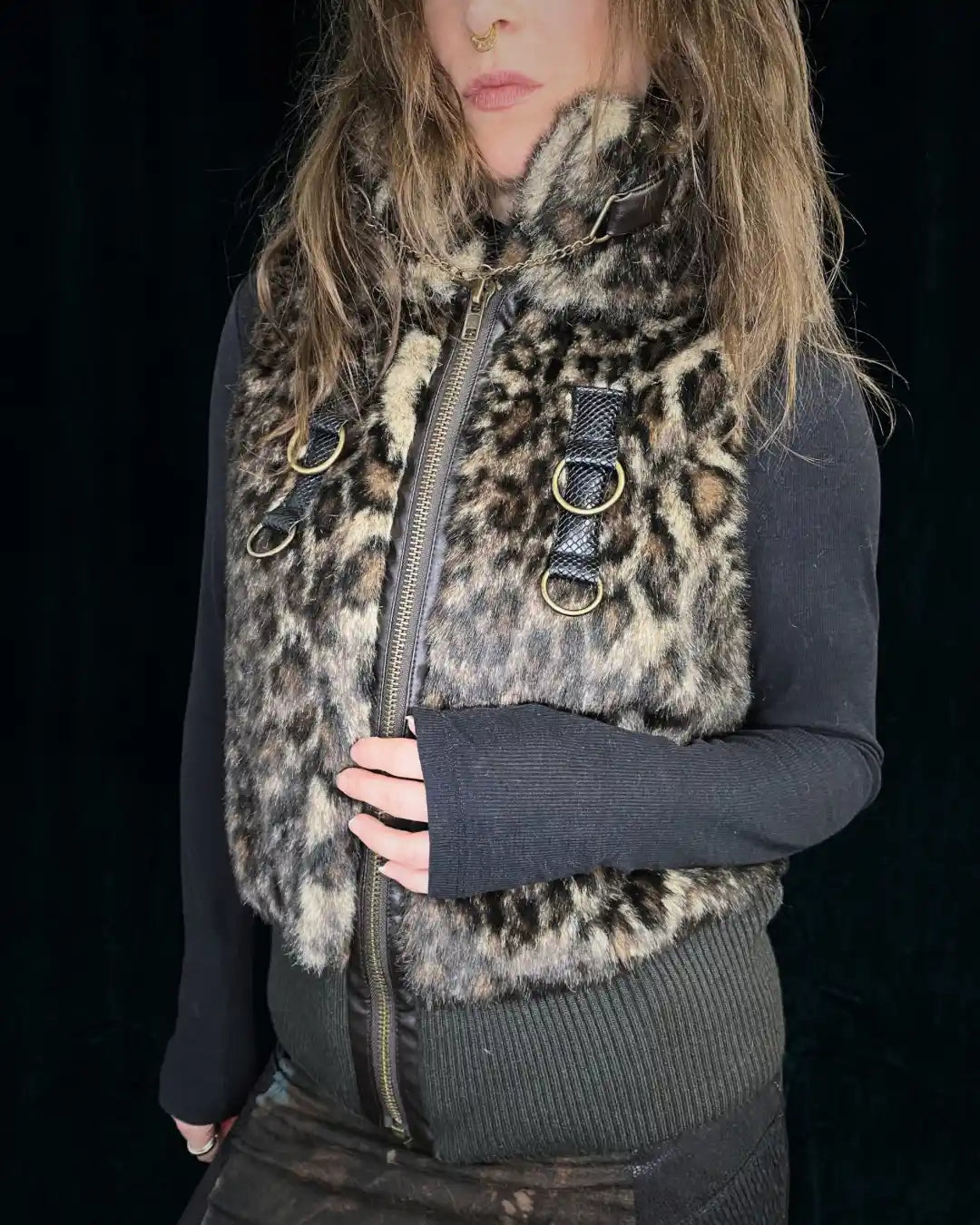 Leo fur vest with stand-up collar, metal appliqués and CAT backpatch